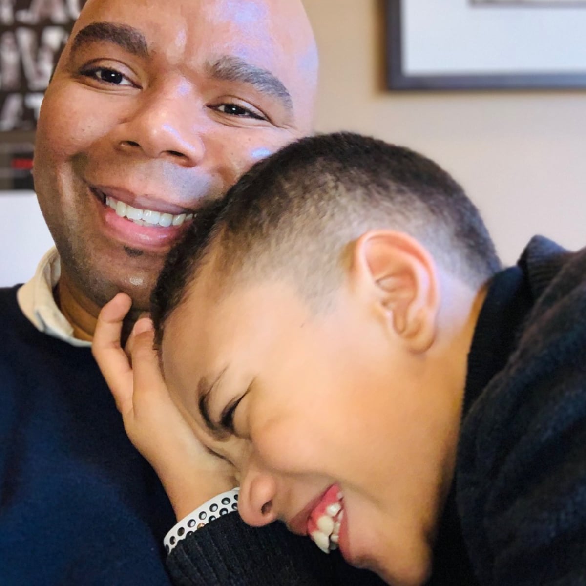 Romanieo Golphin Sr. with his son, Romanieo Jr.